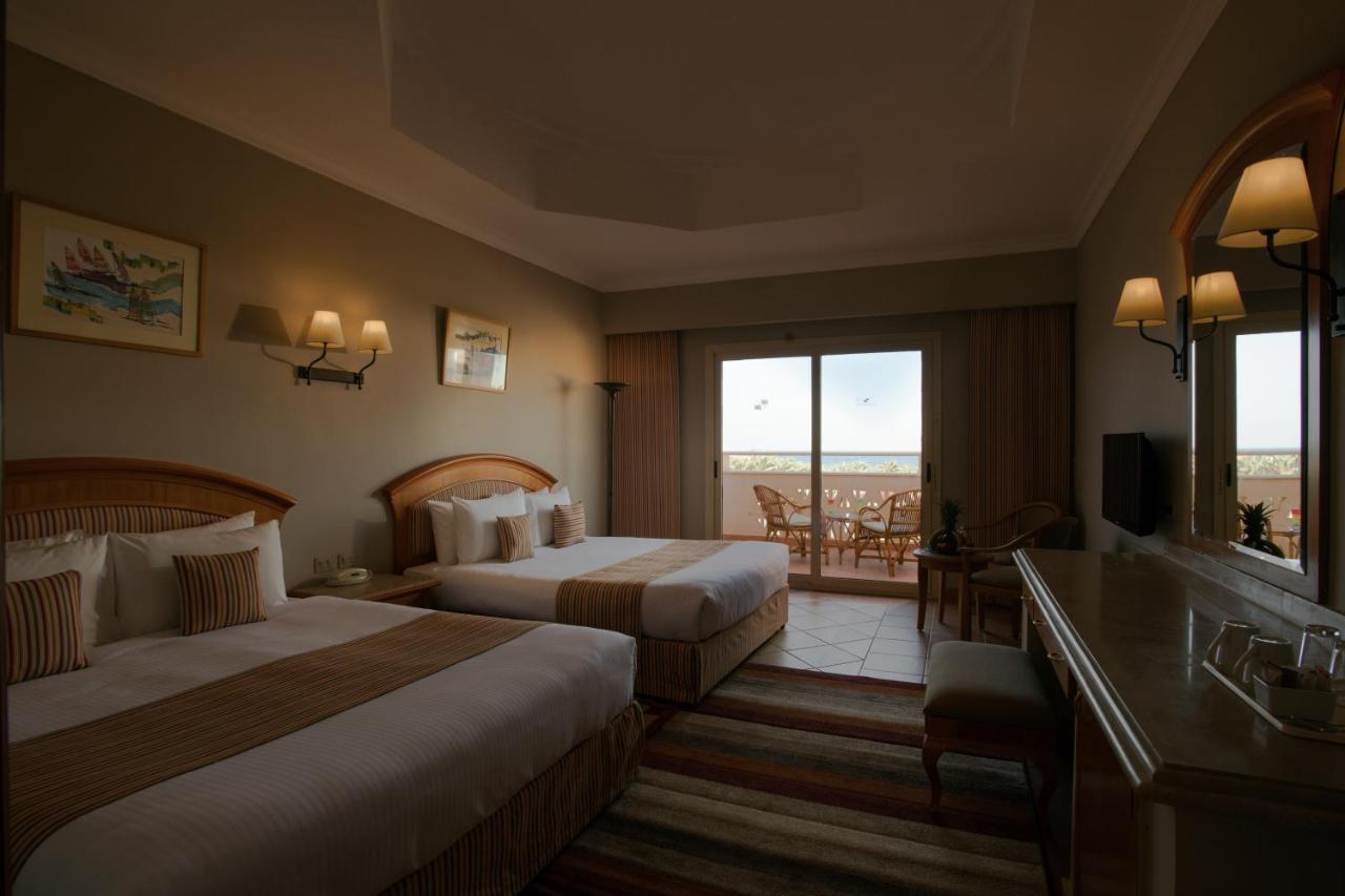 Sharm Grand Plaza Resort - Families And Couples Only Esterno foto A room at the Hilton Sharm El Sheikh