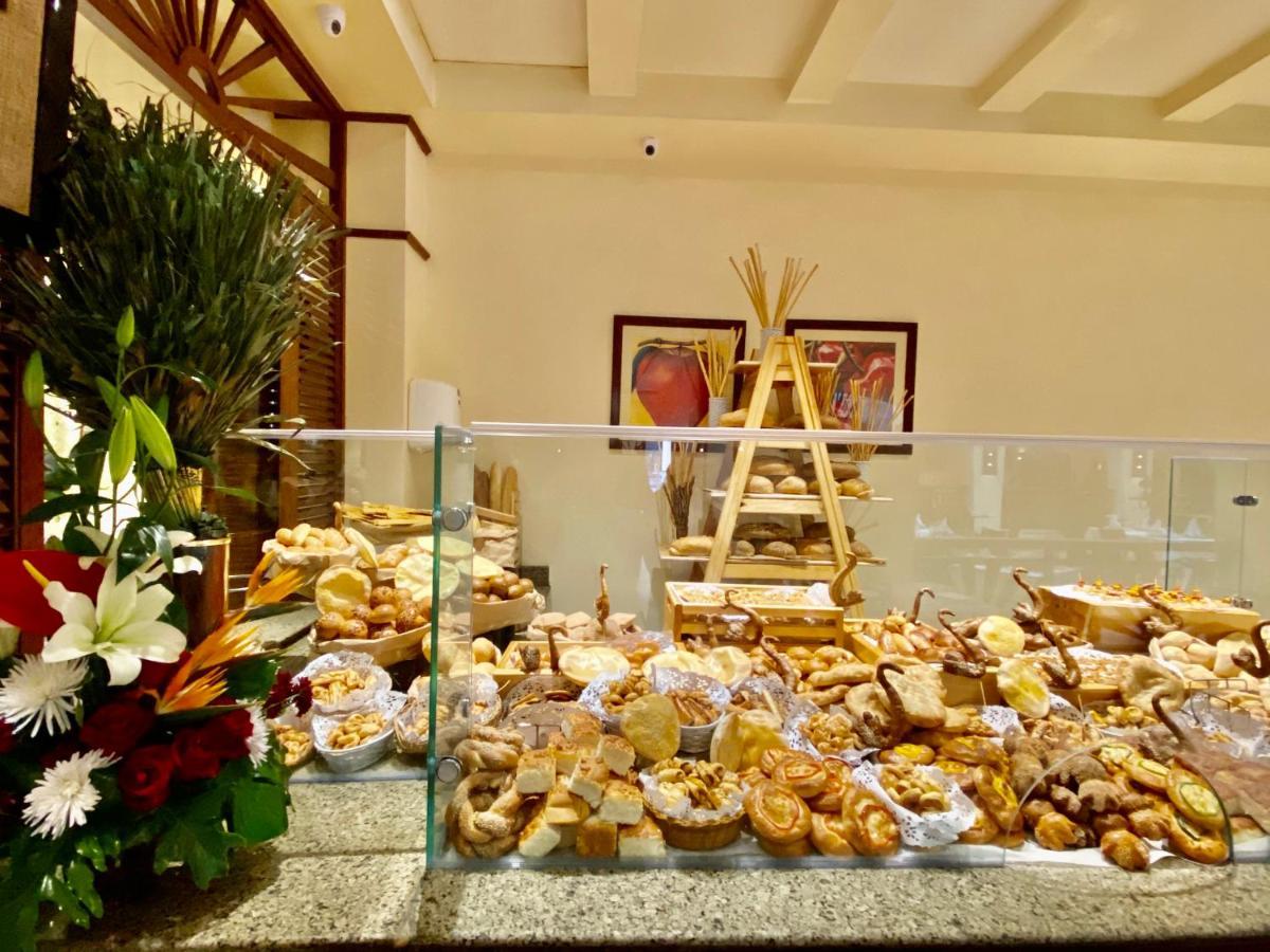 Sharm Grand Plaza Resort - Families And Couples Only Esterno foto A display of various breads at a buffet
