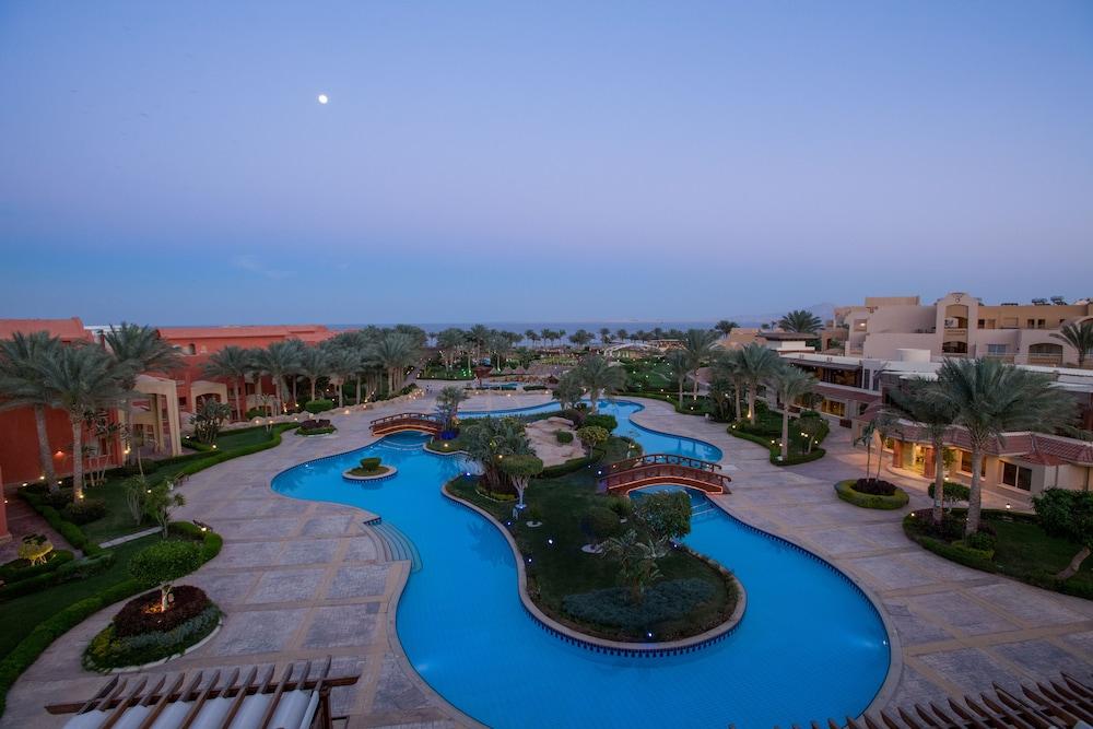 Sharm Grand Plaza Resort - Families And Couples Only Esterno foto The swimming pool at the Hilton Luxor