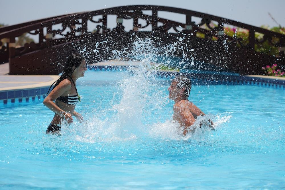 Sharm Grand Plaza Resort - Families And Couples Only Esterno foto Swimming pool