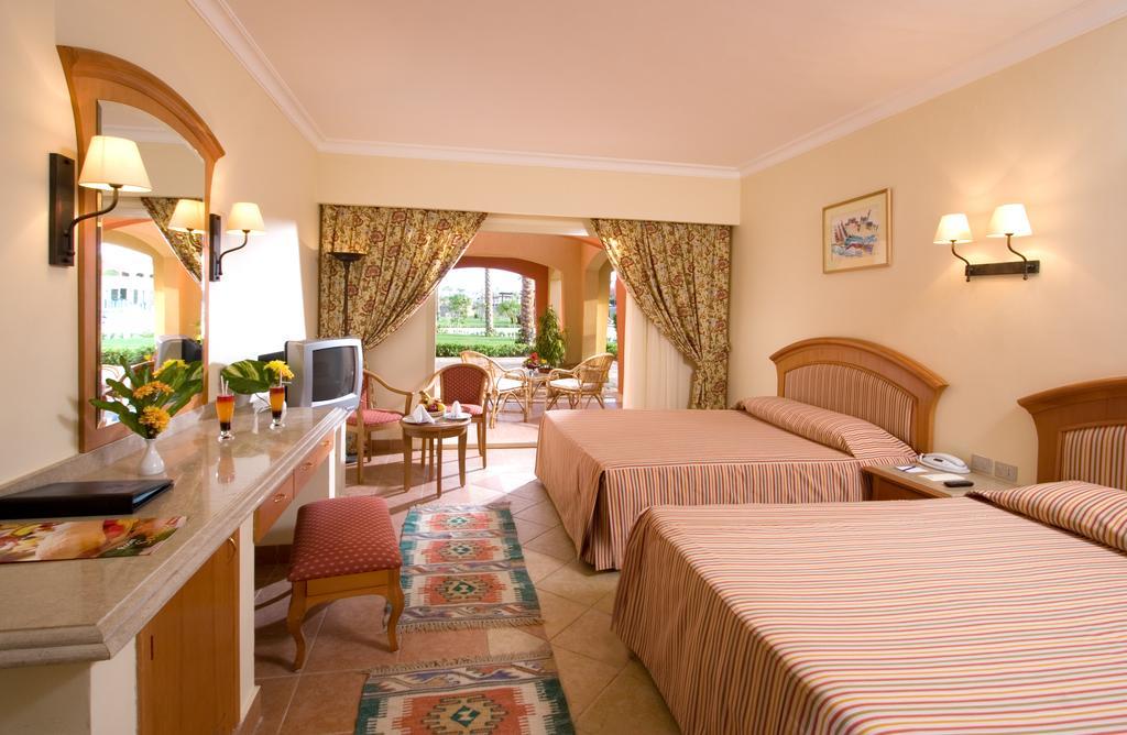 Sharm Grand Plaza Resort - Families And Couples Only Esterno foto A typical hotel room