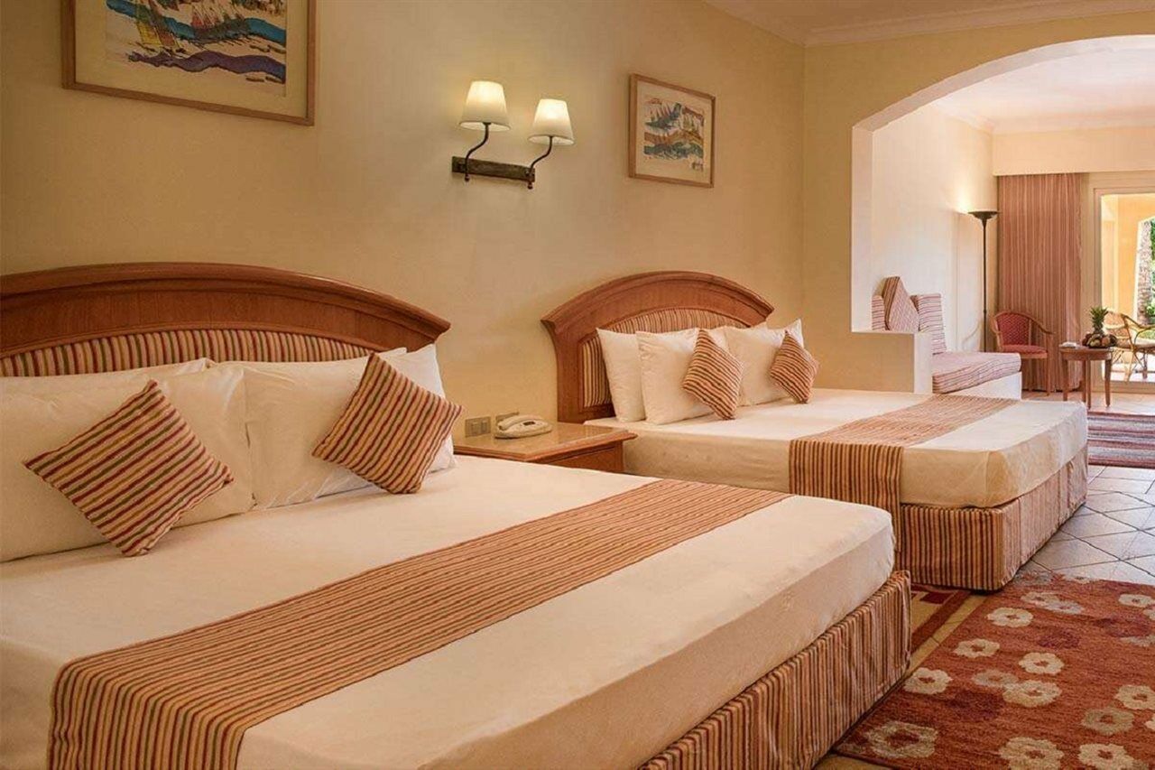 Sharm Grand Plaza Resort - Families And Couples Only Esterno foto A room at the hotel